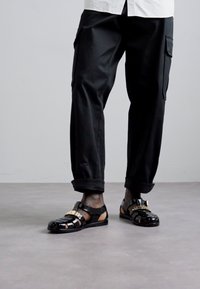 MOSCHINO Sandali - nero