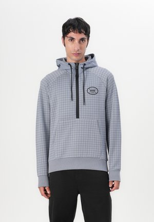 Hooded sweatshirt in light gray featuring a checkered pattern, a half-zip front, and a logo patch. Ribbed cuffs and hem. Casual fit design.