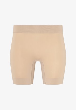 Nahtlose beige Boxershorts mit breitem Bund und mittlerer Oberschenkellänge, entworfen für Komfort und Unterstützung.