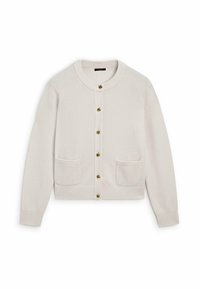 Vaaleanbeige neuletakki, jossa on pyöreä kaulus, ribbireunat, kaksi etutaskua ja kullanväriset napit keskellä.