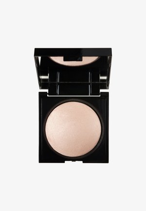 Compact powder highlighter in a glossy black case with a clear lid. The powder is a soft pink shade with a subtle shimmer finish.