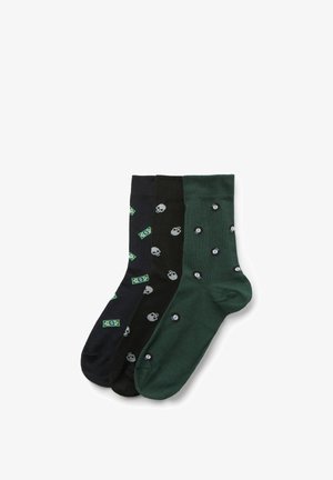 Trois paires de chaussettes montantes en noir et vert foncé, ornées de motifs de billets de banque, de crânes et de boules de billard 8.