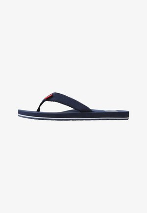 Infradito blu navy con cinturini in tessuto e suola piatta, mostrato di lato su sfondo bianco.