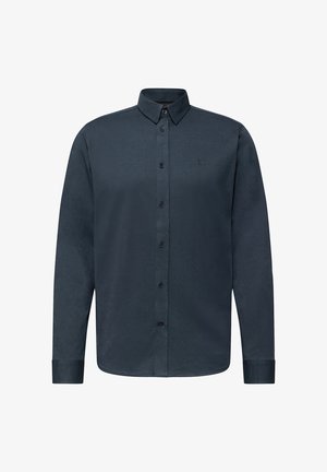 Camicia a maniche lunghe grigio scuro con colletto a punta e logo discreto sul lato sinistro del petto, esposta su sfondo bianco.