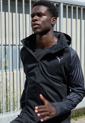 Puma RUN FAVORITE AOP WOVEN JACKET M - Veste de survêtement - black-aop
