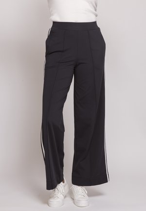 DEENA - Tracksuit bottoms - blue