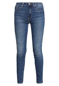 Skinny jeans in donkerblauwe denim, met een soepel textuur, vijf-pocket ontwerp en metalen knoopdetail bij de taille.