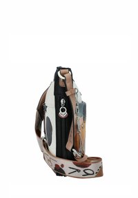 Kleine Umhängetasche aus einer Mischung aus gemustertem Stoff und schwarzen Lederakzenten, mit einem seitlichen Reißverschluss, verstellbarem Schulterriemen und metallischen Beschlägen.