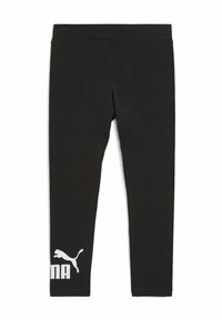 Leggings noirs au design ajusté, fabriqués en tissu extensible. Présente un logo Puma blanc et du texte sur la jambe gauche.