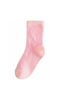 Rosa bomullssocka med ribbad topp, strukturmönster, förstärkt häl och tå för hållbarhet. Slät yta med en mjuk look.
