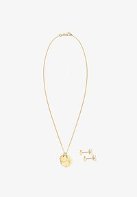 Geselecteerd, gold-coloured