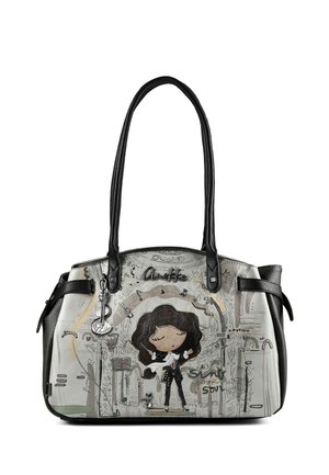 Borsa con manici neri raffigurante una donna in stile cartone animato che canta sul palco, note musicali e piccola illustrazione di un gatto in toni grigio tenue e nero.