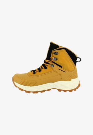 Beige hoge wandelschoen met zwarte gevoerde kraag, gele veters, metalen veteroogjes, robuuste bruine zool en witte tussenzool.