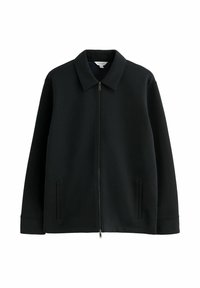 Black long-sleeve jacket with pointed collar, front zipper closure, and two vertical side pockets, displayed on white background.