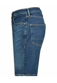 Pantalones cortos de mezclilla azul con bolsillos laterales y traseros, costuras amarillas y pasadores para cinturón, mostrados de lado sobre un fondo blanco.