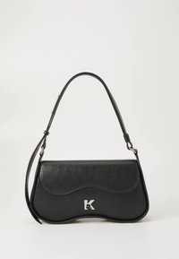 Black leather handbag with curved design, silver hardware logo, and a single adjustable strap. Smooth texture, structured shape.