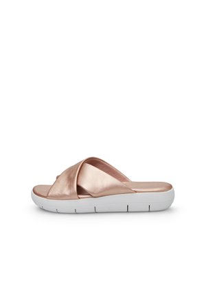 Rose gold slide sandal with a cross-over synthetic upper, soft footbed, and a lightweight white EVA sole with grooves for traction.