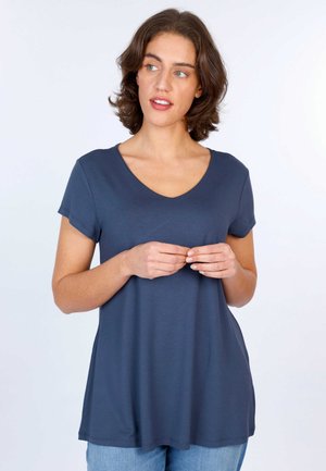 Navy V-Ausschnitt-Top mit kurzen Ärmeln und lockerer Passform, hergestellt aus weichem, glattem Stoff. Verfügt über einen dezenten abgerundeten Saum und ein lässiges Design.