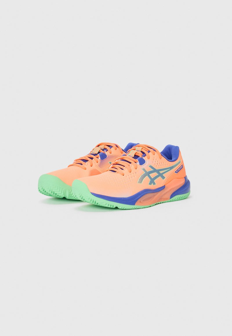 Lightweight athletic shoes in bright orange with green accents. Features a breathable mesh upper, multicolored laces, and textured sole.