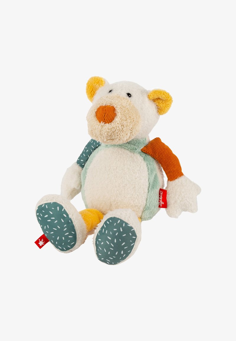 Stuffed bear toy with a fluffy white body, green accent, orange nose, and colorful textured limbs. Patterned soles and a red tag.