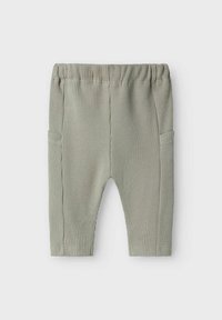 Lichtgroene, geribde stof broek met een elastische tailleband en twee zijzakken. Rechtaf broekontwerp met een zachte textuur en een minimaal patroon.