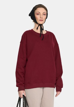- Bluza