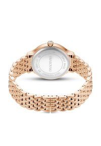 Zegarek ze stali nierdzewnej w kolorze różowego złota z bransoletą mesh, okrągłą kopertą i przejrzystą tarczą, z małym kryształem na koronce. Wodoodporny do 50 m.