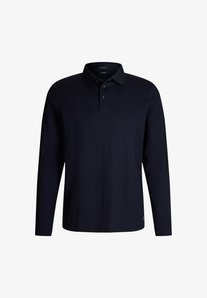 Granatowa koszulka polo z długim rękawem w diamentowy wzór, z kołnierzykiem i zapięciem na dwa guziki. Miękka tekstura i luźny krój.