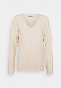 Maglione beige lavorato a maglia con scollatura a V profonda, maniche lunghe e orlo dritto. Texture morbida e design minimalista senza decorazioni.