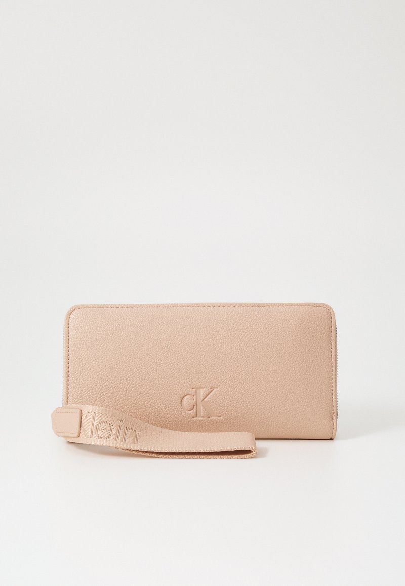 Calvin Klein Jeans ULTRALIGHT ZIP AROUND - Lommebok - rose dust