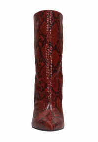 Red snakeskin knee-high boot with a pointed toe, glossy finish, and textured surface featuring black accents and a fitted design.