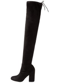 Bottes noires montantes au-dessus du genou en suède avec un talon épais, présentant un design élégant et une fermeture à lacets en haut pour un ajustement personnalisable.