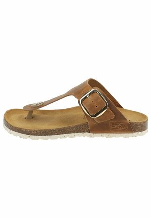Brune lædertanga sandal med en metalspænde og tekstureret indersål. Sålens mønster er spraglet i hvid og brun.