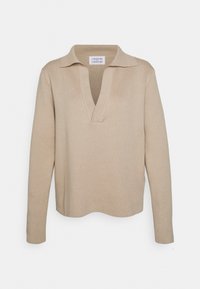 Beige gebreide trui met lange mouwen, open V-hals en een losse pasvorm, gelabeld Libertine Libertine.