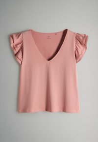Tričko s krátkym rukávom a výstrihom do V v mäkkej ružovej tkanine, s volánikovými doplnkami na ramenách a vo voľnom strihu so stiahnutým lemom.