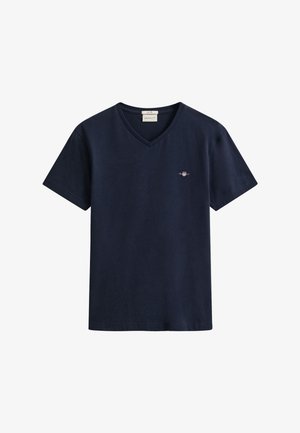Navy blauwe V-hals T-shirt met korte mouwen, met klein geborduurd logo op de linkerborst en GANT-label binnen in de kraag.