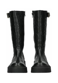 Botas de cuero negro hasta la rodilla con un patrón floral texturizado, suelas de goma planas y cierre de cremallera lateral. Accentuadas con una hebilla metálica.
