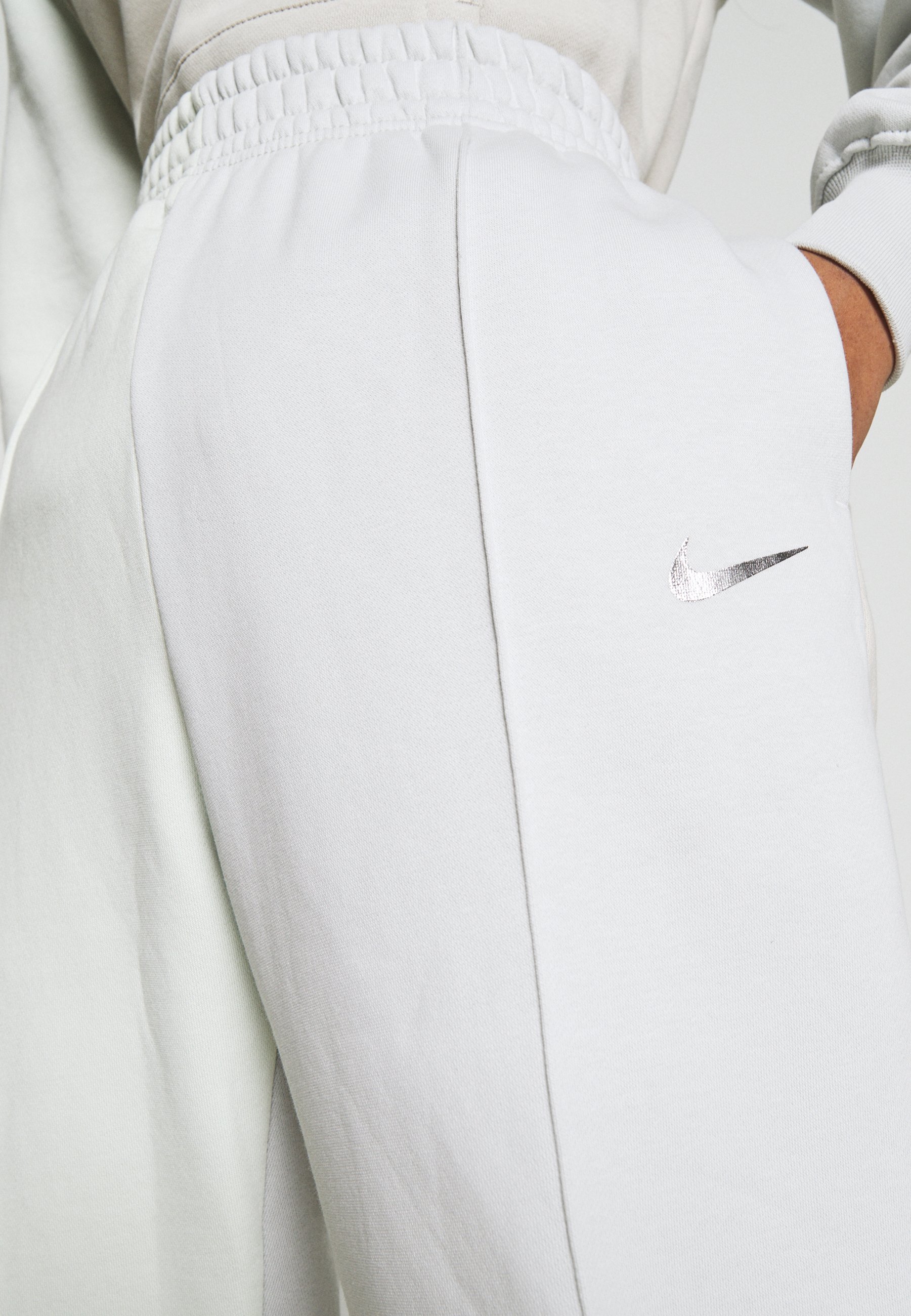 nike light bone tracksuit