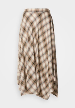 Φούστα τύπου περιτύλιξης σε κρεμ, καφέ και μαύρες αποχρώσεις, φτιαγμένη από μαλακό ύφασμα. Διαθέτει ασύμμετρη γραμμή και ροή στο σχήμα.