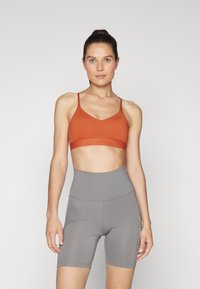 Nike Performance INDY BRA - Sportski grudnjak s blagom potporom - burnt sunrise