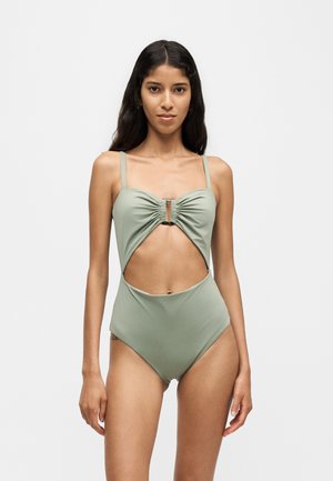 Anemos TORTOISE RING CUT OUT ONE PIECE - Maillot de bain - laurel