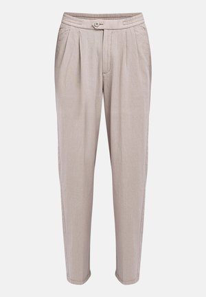 Φωτεινό μπεζ παντελόνι προσαρμοσμένης γραμμής με πιέτες μπροστά, πλαϊνές τσέπες, κλείσιμο με κουμπί και στενές, κωνικές μπατζάκια.