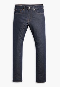 Mörkblå denimjeans med rak benpassform, fem fickor och orangea sömnads detaljer. Tygmaterialet har en slät yta.