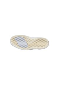 Suola della scarpa con un motivo a nido d'ape testurizzato in crema e grigio. Presenta un contorno bianco e un pad di presa centrale grigio.