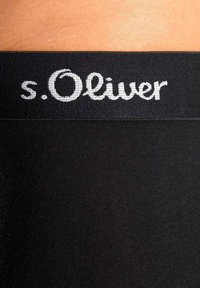 Black leggings with a smooth texture, featuring a thick waistband labeled "s. Oliver" in contrasting gray lettering.