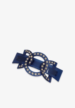 Blauer Kunststoff-Haarclip mit ineinandergreifenden Schlaufen und kreisförmigen Details, die mit kleinen, klaren Strasssteinen verziert sind. Glatte Textur und glänzende Oberfläche.