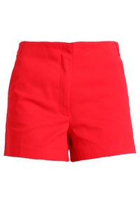 Shorts rouges en tissu léger, avec un design ajusté, un devant épuré et des poches latérales. Coupe moderne et minimaliste.