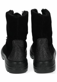 Black suede ankle boots with a textured, glittery back panel and a thick rubber sole. Features a soft, lined interior for warmth.