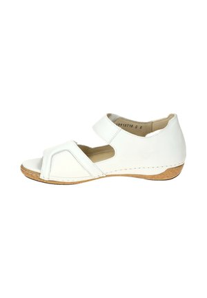 White open-toe sandal with adjustable strap and low cork wedge heel designed for comfort and support.