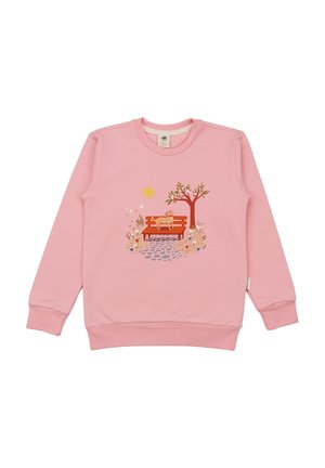Light pink sweatshirt with a sunny park scene featuring a brown dog on a bench, a tree, flowers, and a stone path.